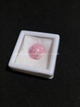 CABOCHON SHAPED CARVED IN RHODOCHROSITE OVAL.-
