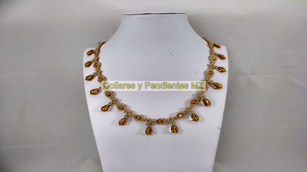 NECKLACE WITH YELLOW FACETED RONDELS.-